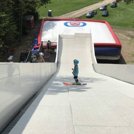 Artificial ski slope with synthetic snow surface at a snow park